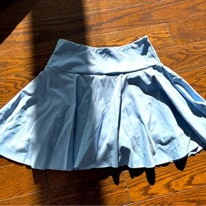 Blue athletic skirt with built in shorts